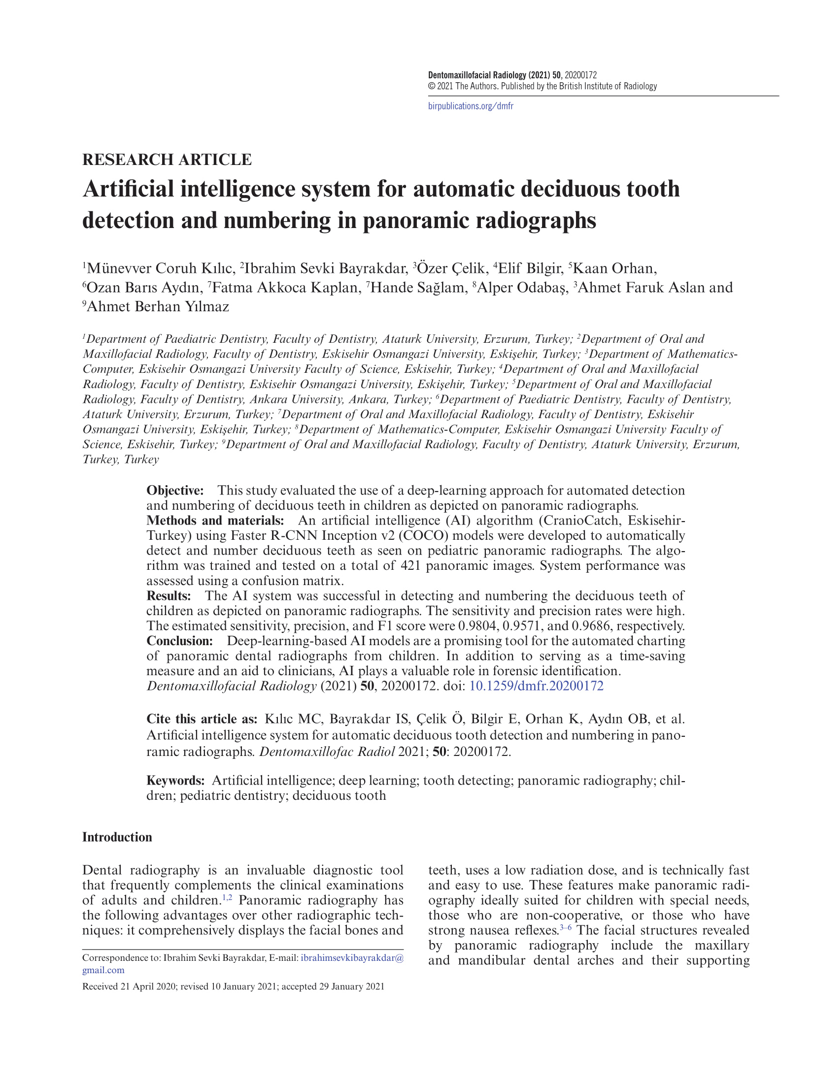 Artificial intelligence system for automatic deciduous tooth detection and numbering in panoramic radiographs