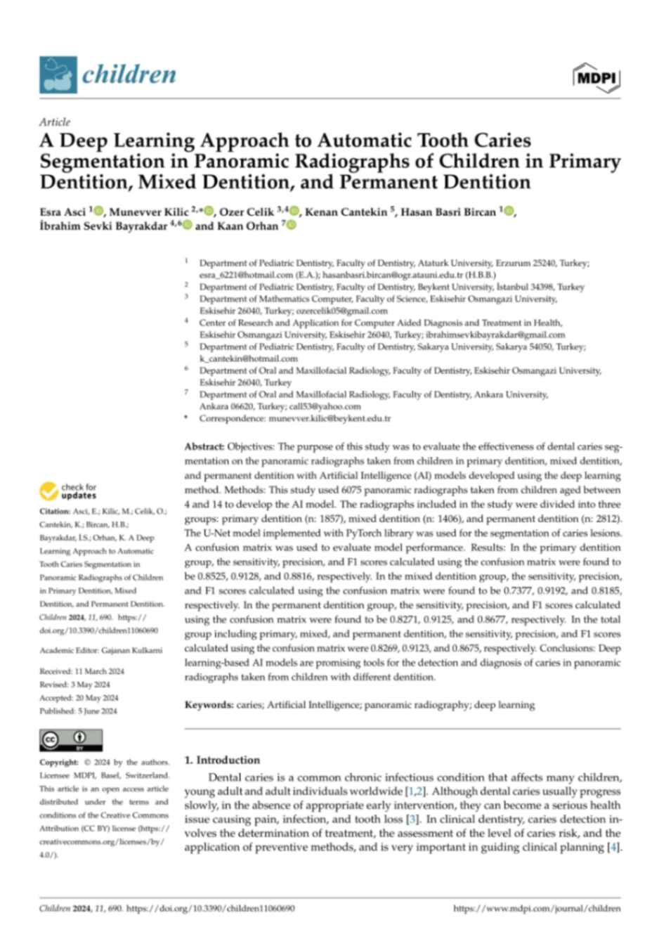 A Deep Learning Approach to Automatic Tooth Caries Segmentation in Panoramic Radiographs of Children in Primary Dentition, Mixed Dentition, and Permanent Dentition