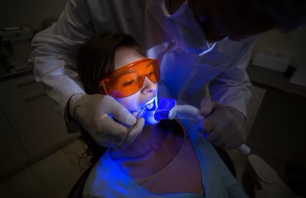 Tooth doctor treats his patient.